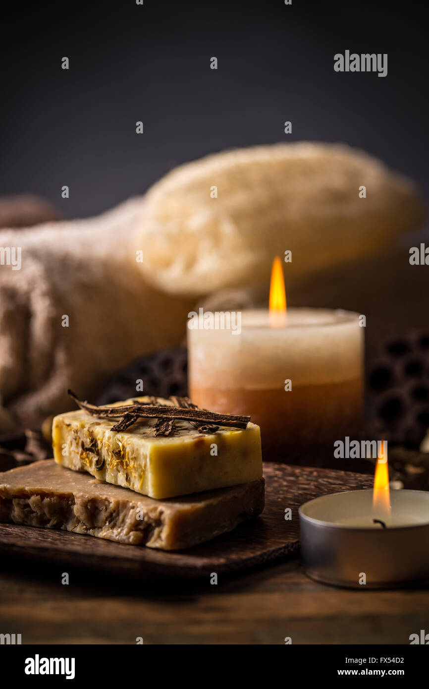 Spa concept with handmade soap and burning candle Stock Photo