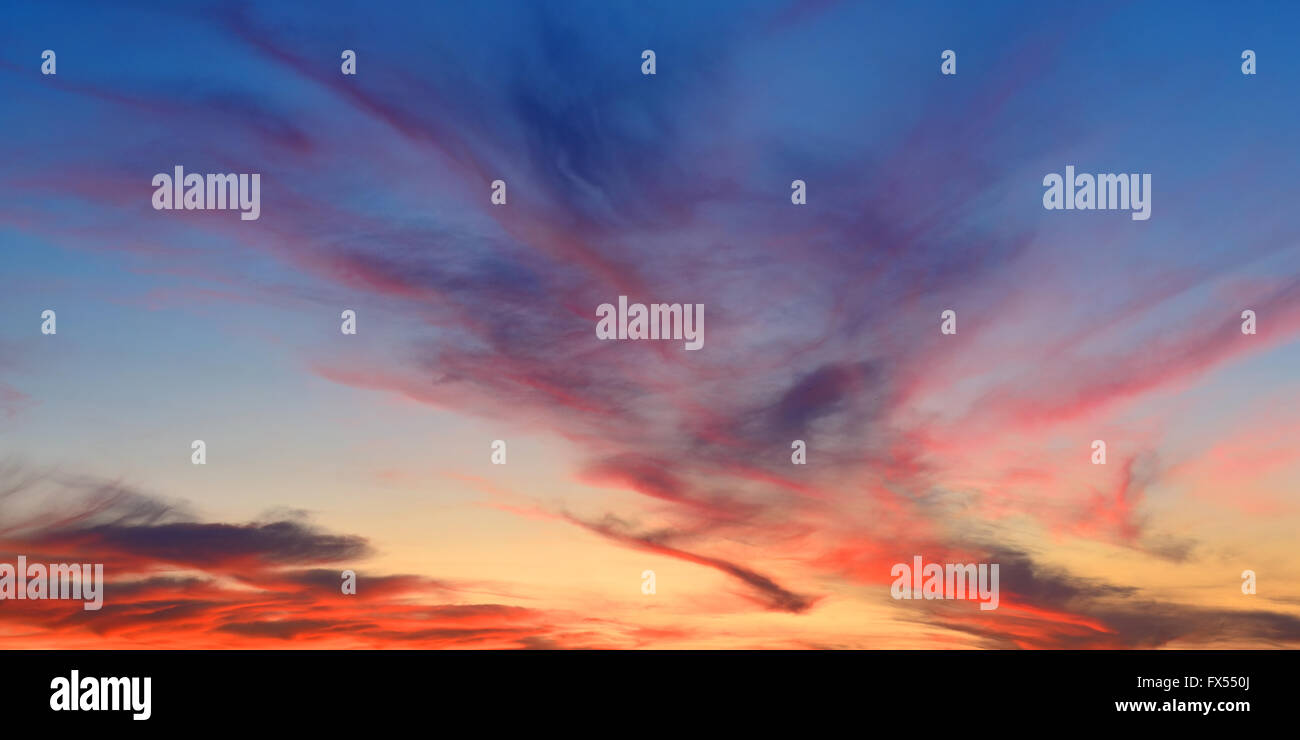 Colorful cloud in sky at sunset Stock Photo - Alamy