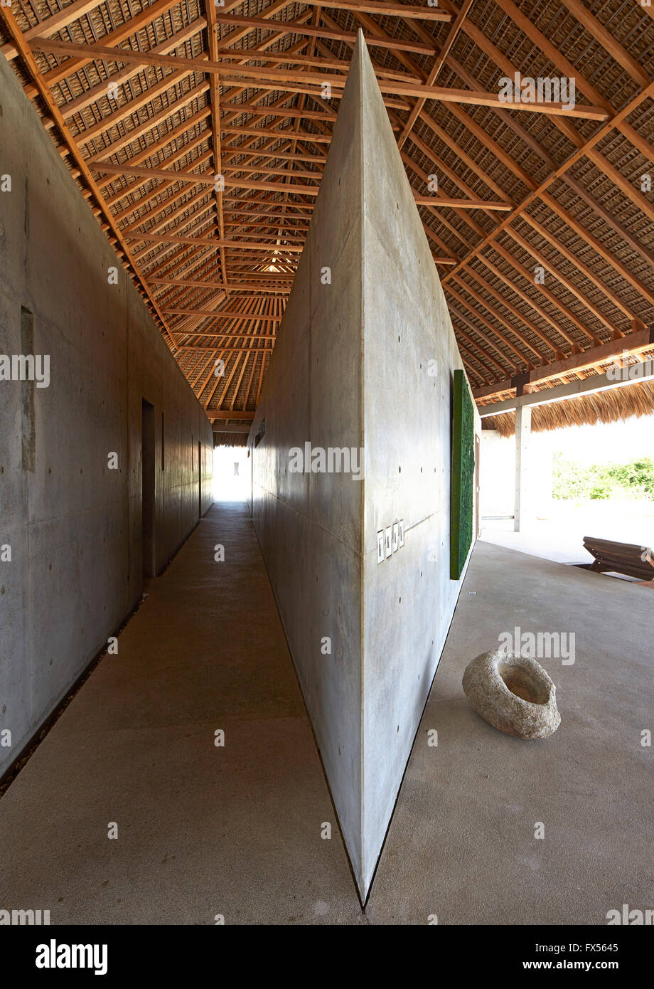 Interior view of main Palapa showing triangular concrete living quarters. Casa Wabi, Puerto Escondido, Mexico. Architect: Tadao Stock Photo