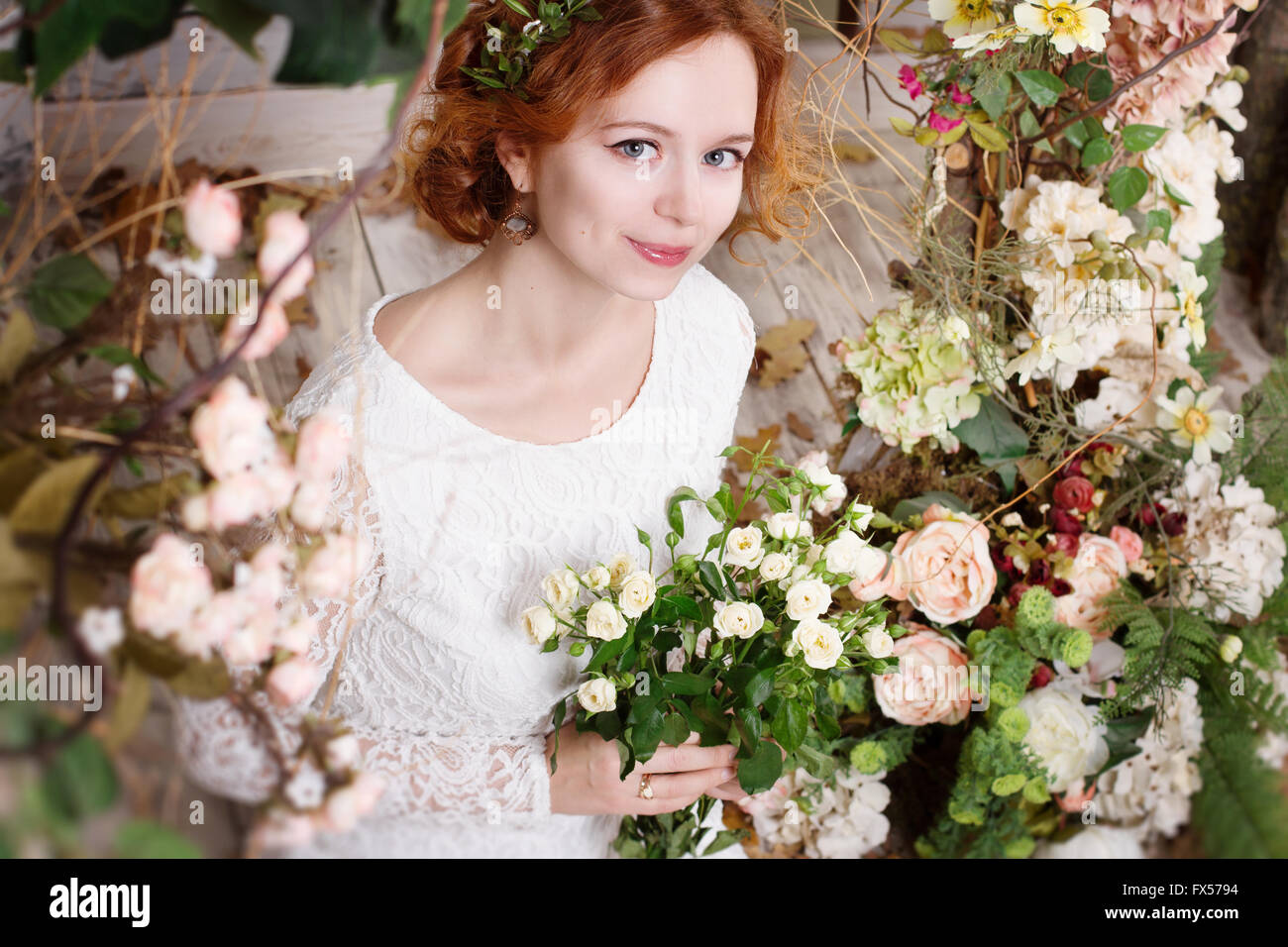 Surrounded by flowers hi-res stock photography and images - Alamy