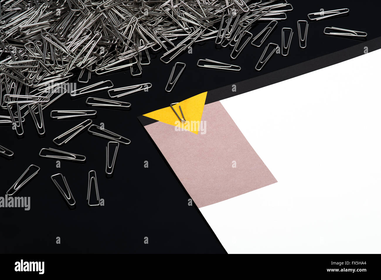 Paper clips Paper-clips with paper note on black background Stock Photo ...