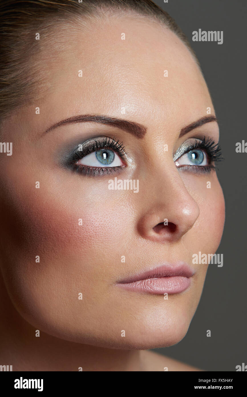 Closeup portrait of a beautiful woman styled for fashion Stock Photo ...