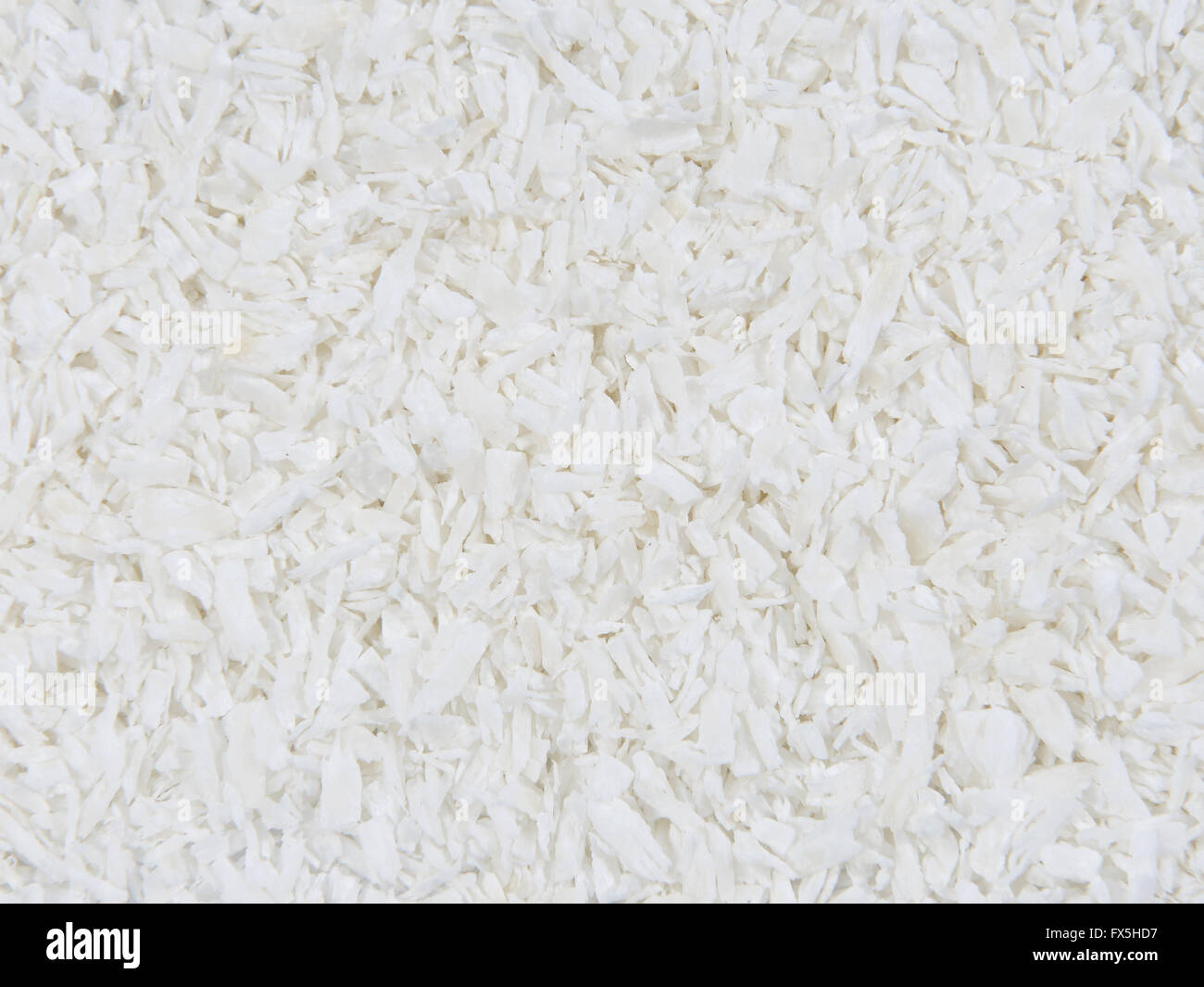 Closeup image of fresh ecological grated coconut Stock Photo