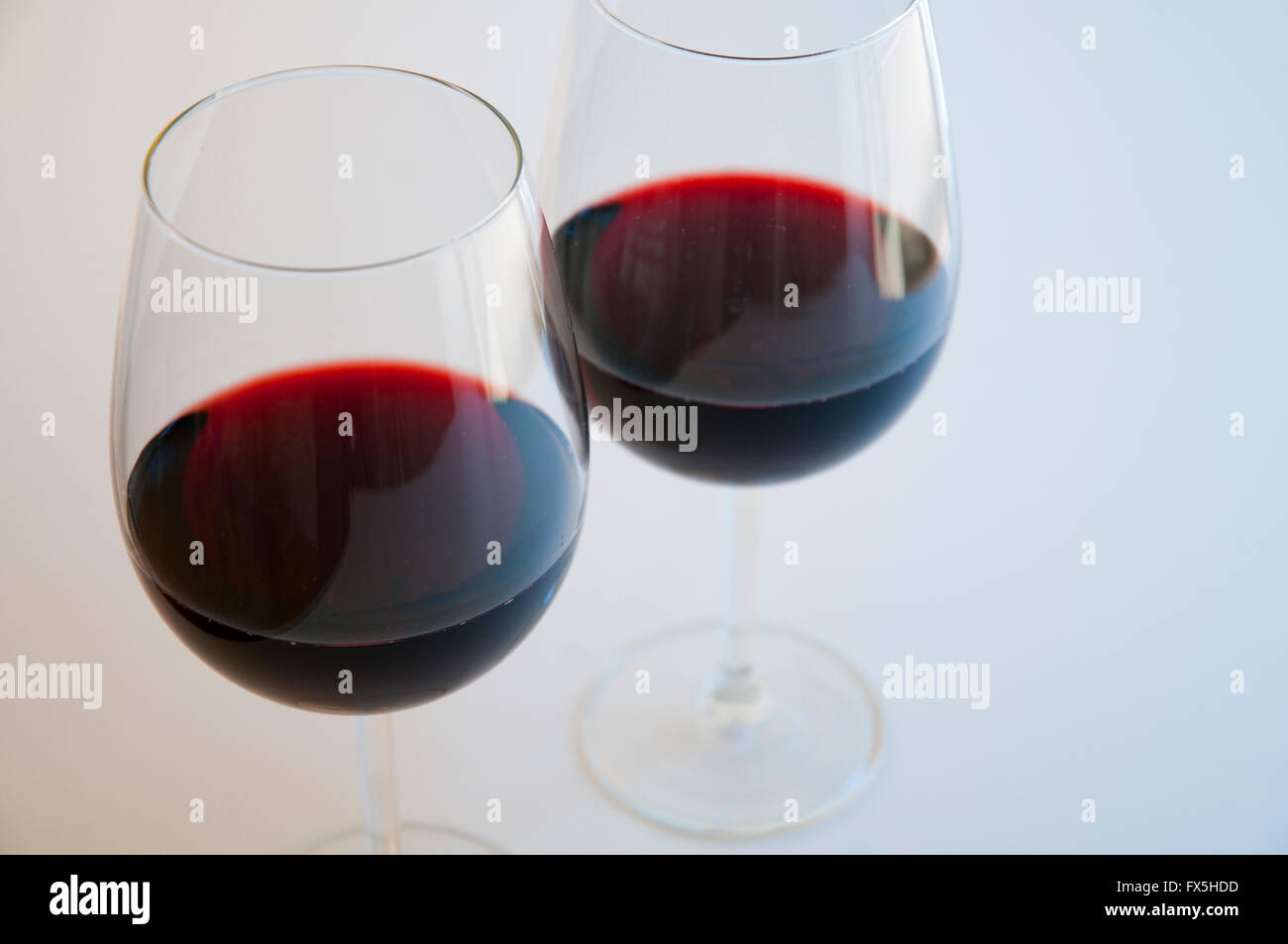 Two glasses of red wine. Close view. Stock Photo