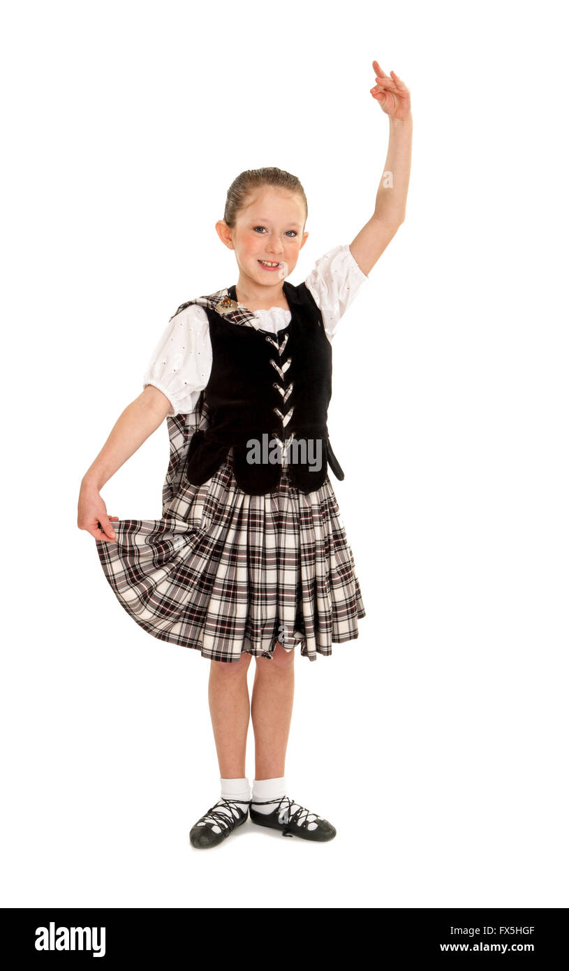 A child dancer in traditional Celtic or Irish or National Costume Stock Photo