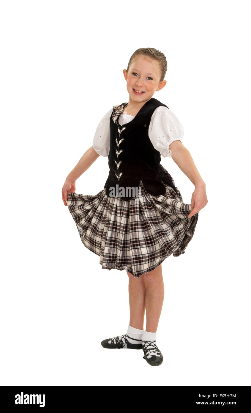Cheerful Young Irish National Dancer in Ghillies and Performance Tartan Stock Photo