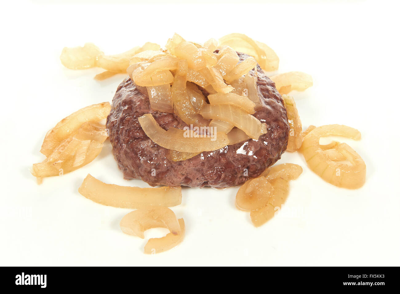 Minced meat steak with fried onions on top Stock Photo
