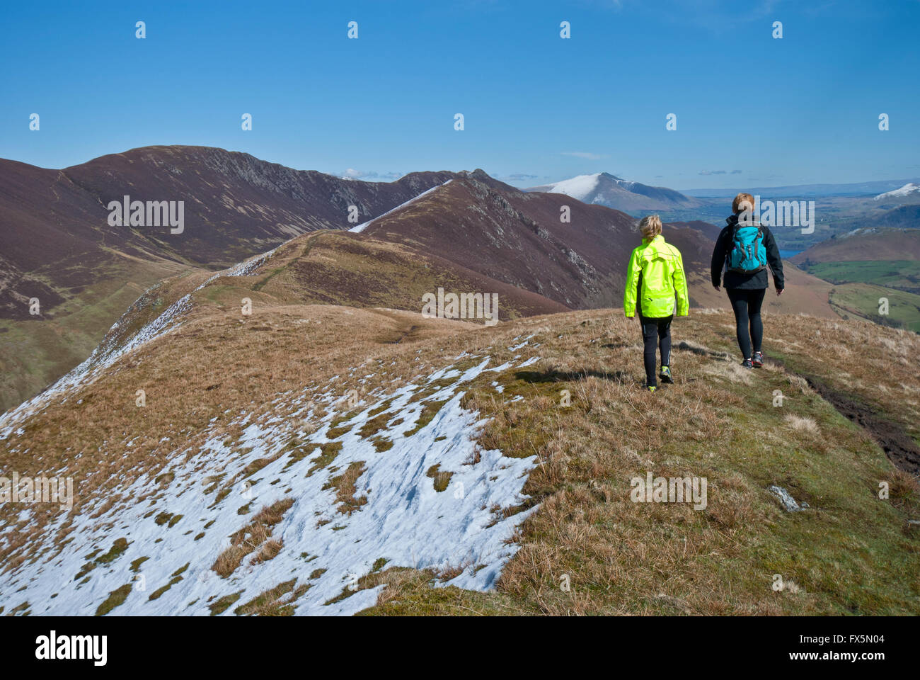 Family walk on Lake District fell Ard Crags in the Newlands Valley in early Spring. Stock Photo