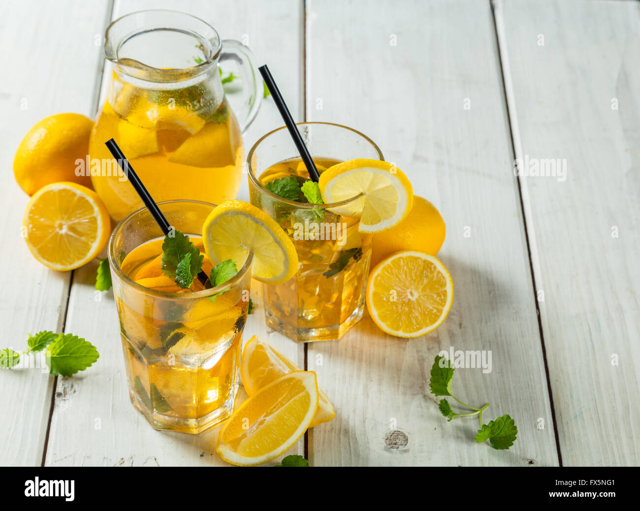 A Pitcher of Iced Tea with Lemons – License Images – 647456