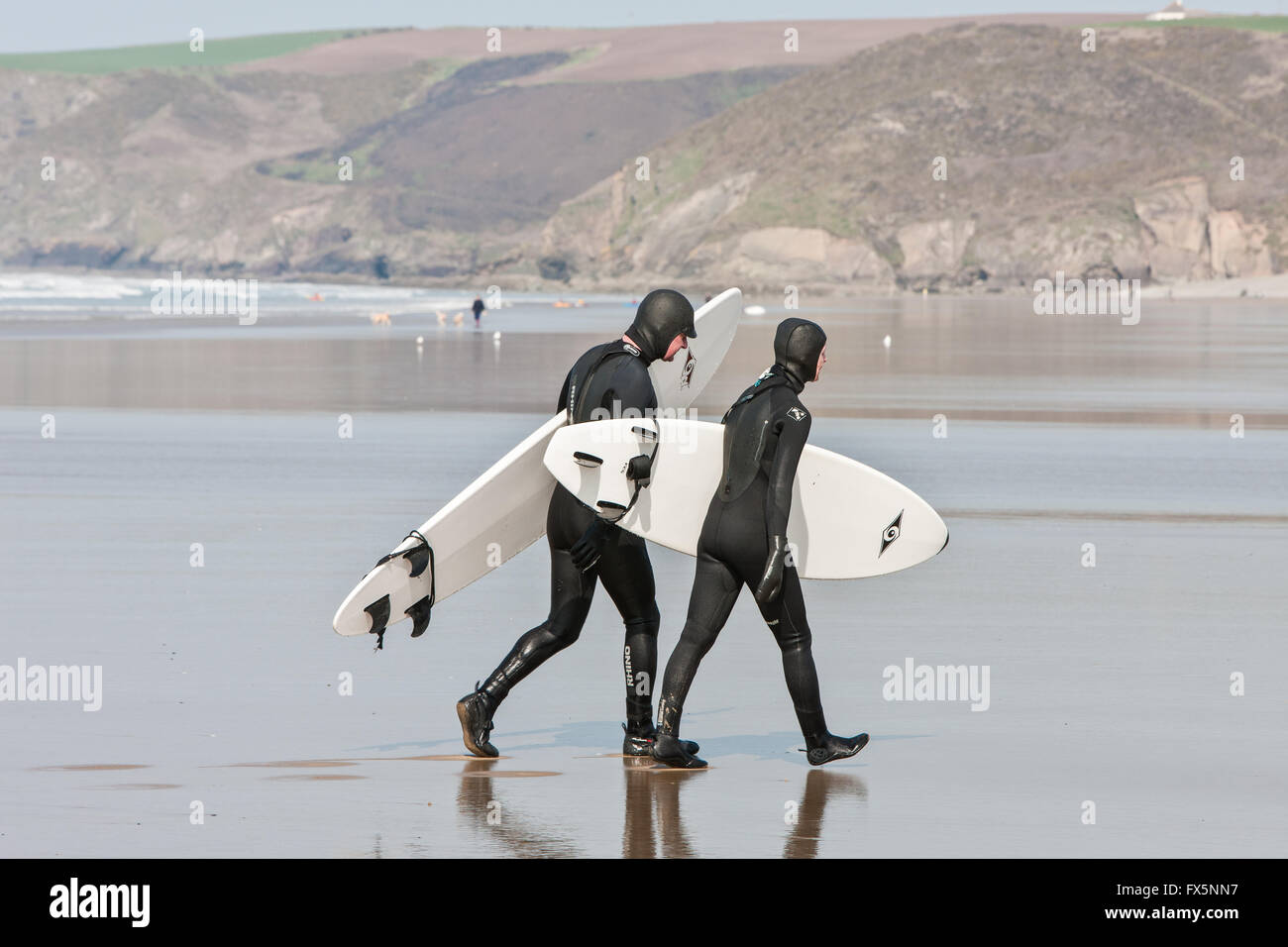 Surfers in winter wetsuits surf hi-res stock photography and images - Alamy