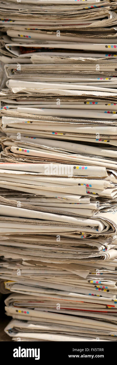 huge pile of newspapers and waste paper collected for recycling Stock Photo