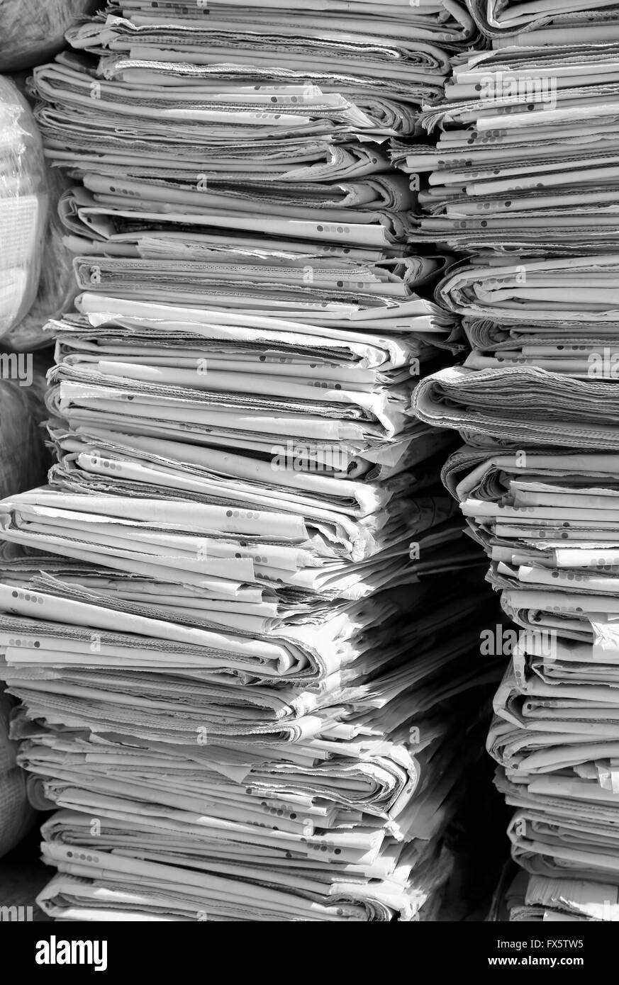 bunch of many newspapers used ready to be thrown in the waste paper Stock Photo