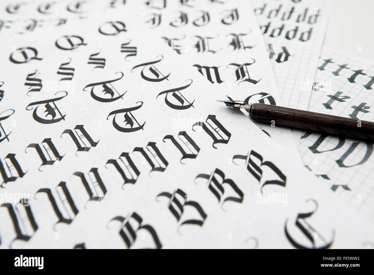 Calligraphy in Gothic style, the old font texture Stock Photo