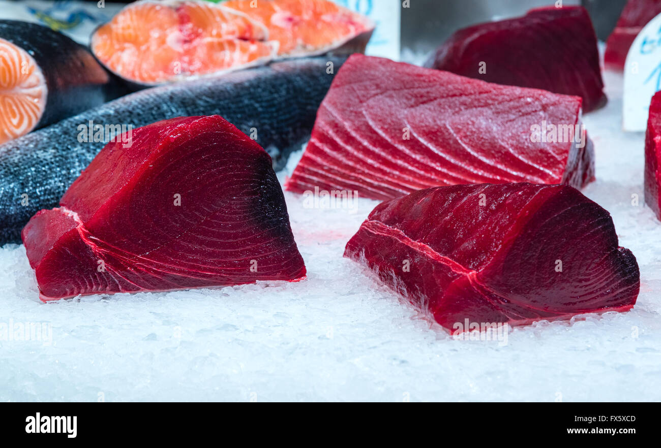 freshly cut tuna filet on ice Stock Photo