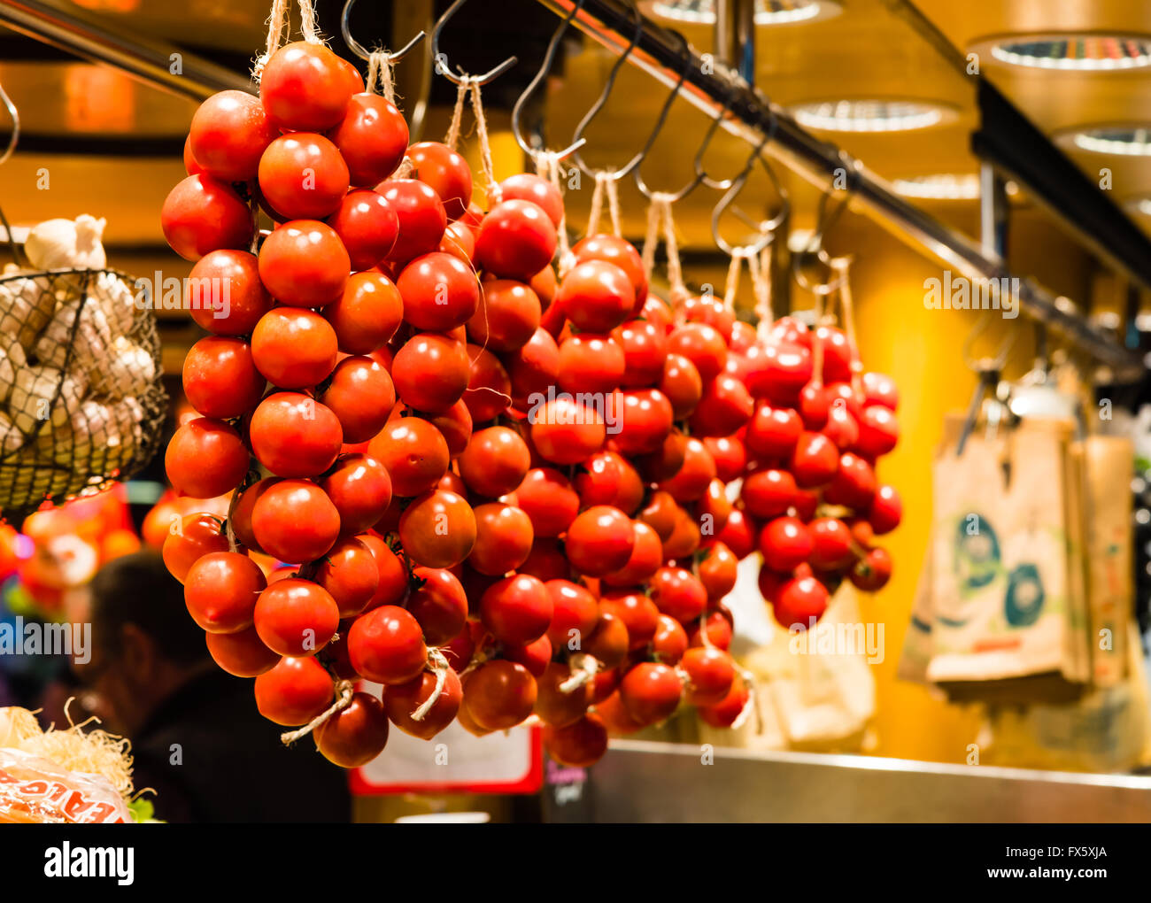 organic red tomatoes on display on a local market Stock Photo