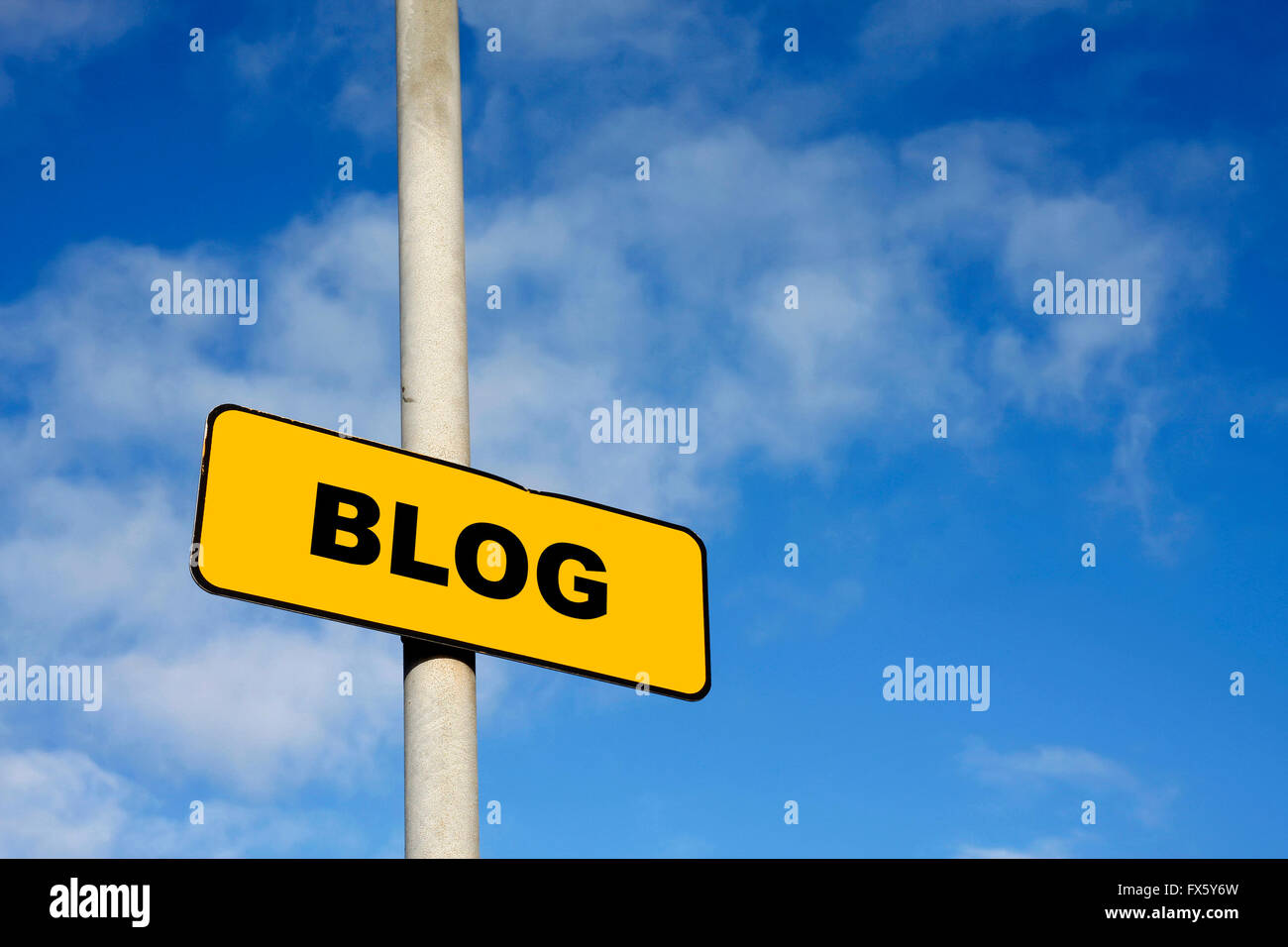 Yellow blog sign against a blue sky Stock Photo