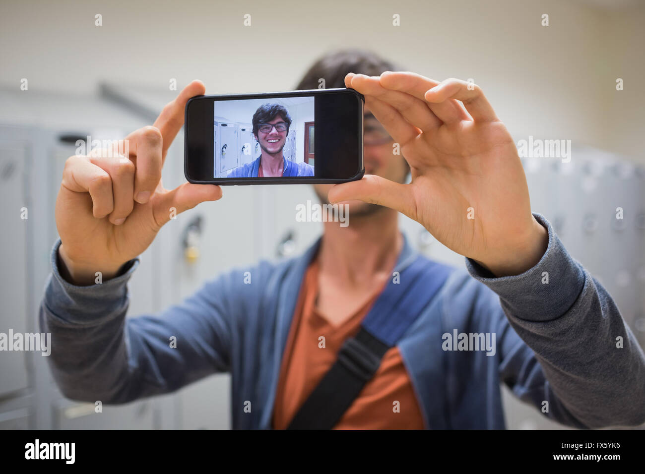 Student taking his selfie on smartphone Stock Photo - Alamy