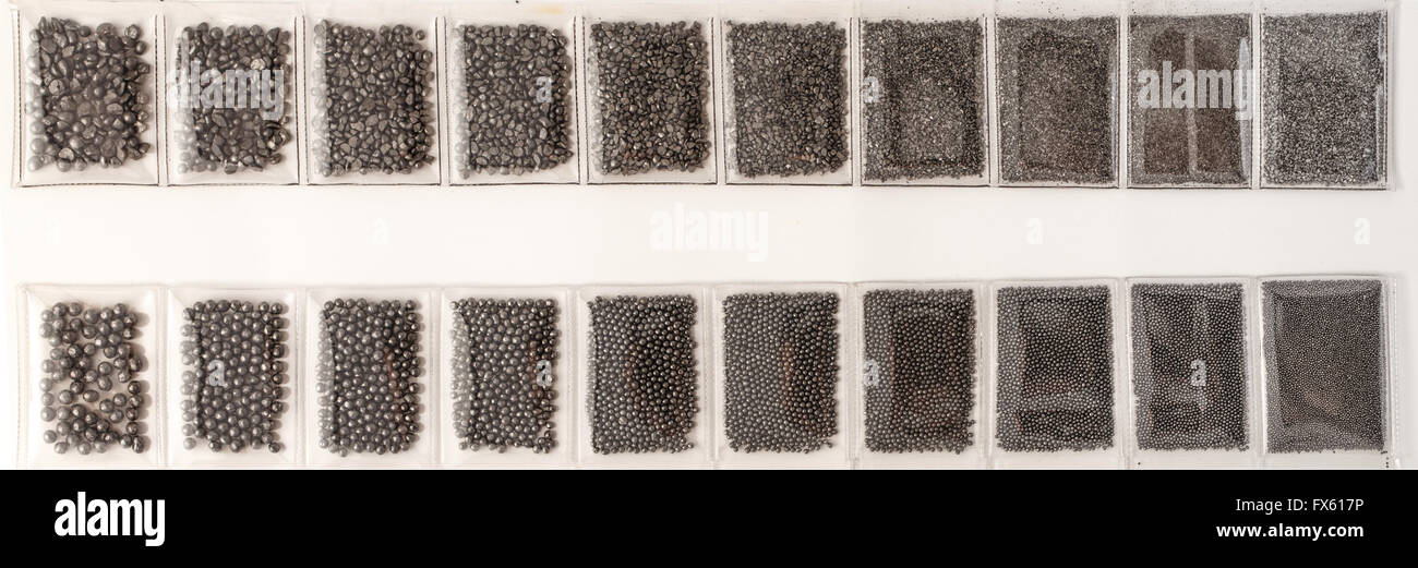 Collection of plastic bags with grit for blasting Stock Photo Alamy