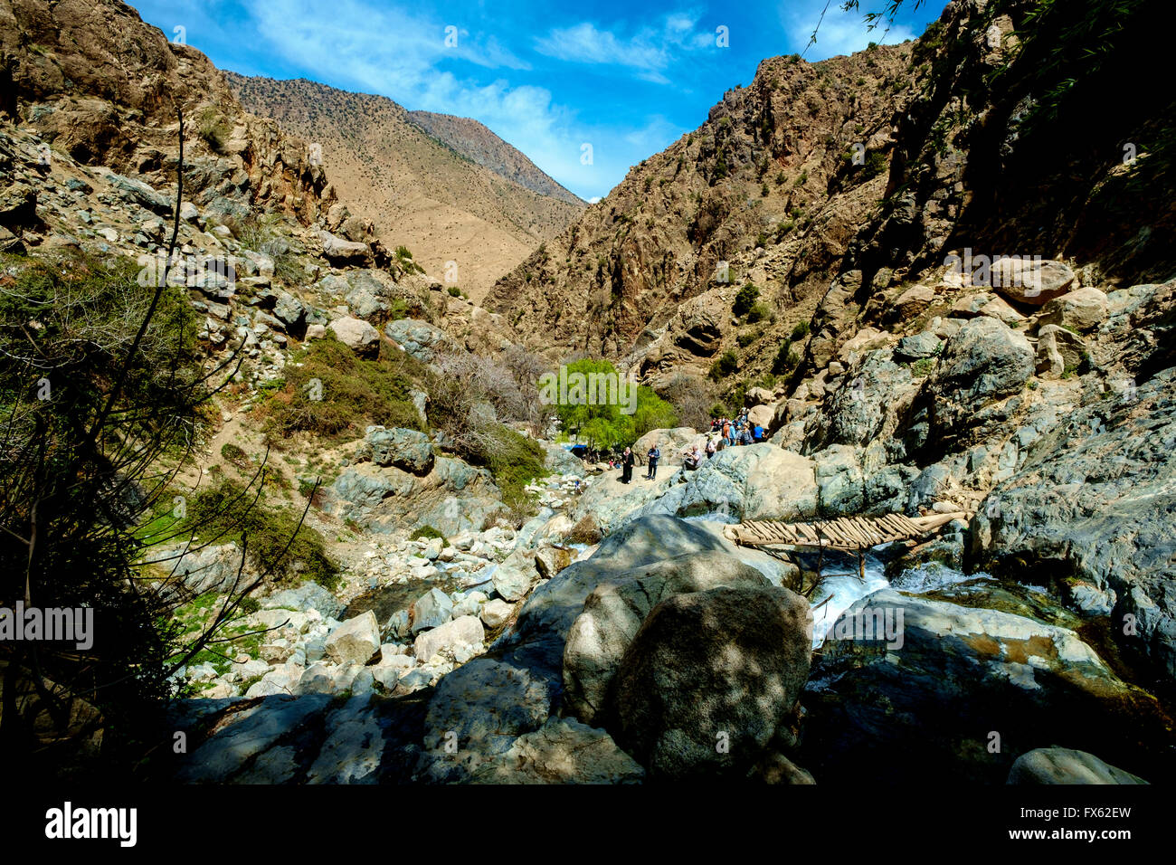 Tourists on the steep narrow trail into the Atlas towards the Setti-Fatma waterfalls Stock Photo