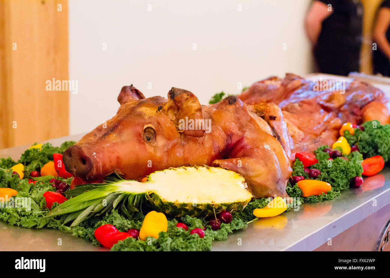 Whole Pig At A Wedding Reception With An Apple In Its Mouth On A