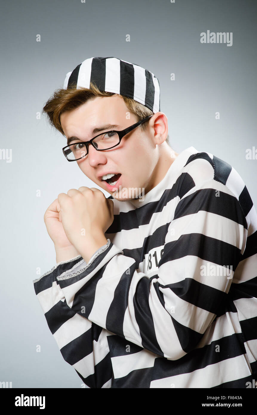 Funny prisoner in prison concept Stock Photo Alamy
