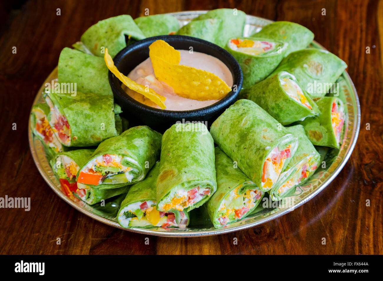 Mexican restaurant offering a gluten-free alternative to their traditional cuisine with these vegan veggie vegetarian wraps. Stock Photo
