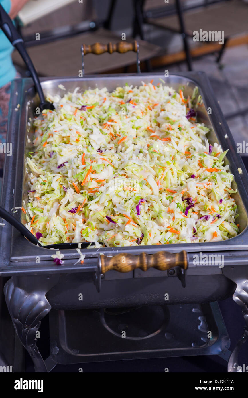 Coleslaw or slaw at a wedding reception party buffet line. Stock Photo