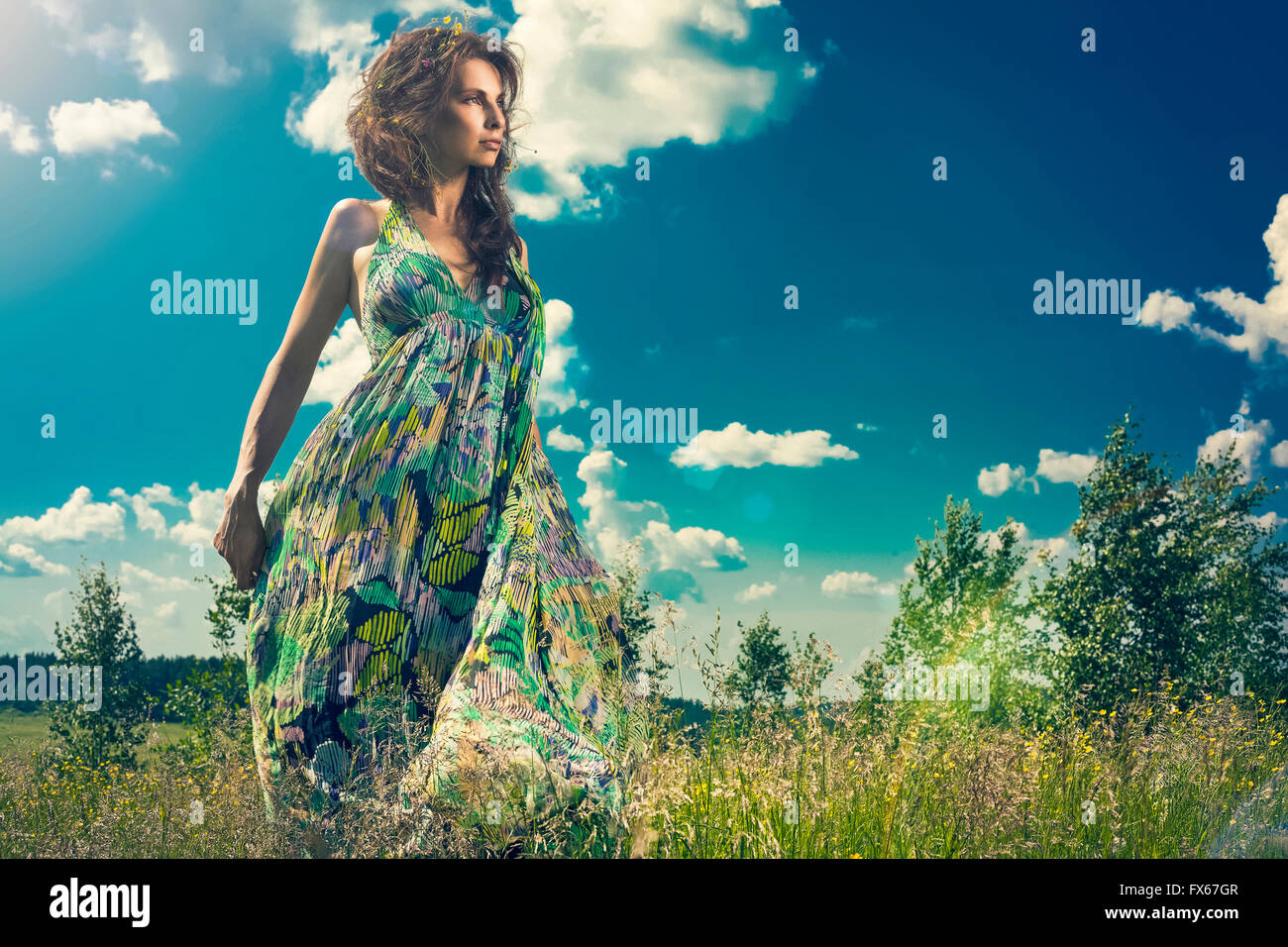 Woman standing in dress back hi-res stock photography and images - Alamy
