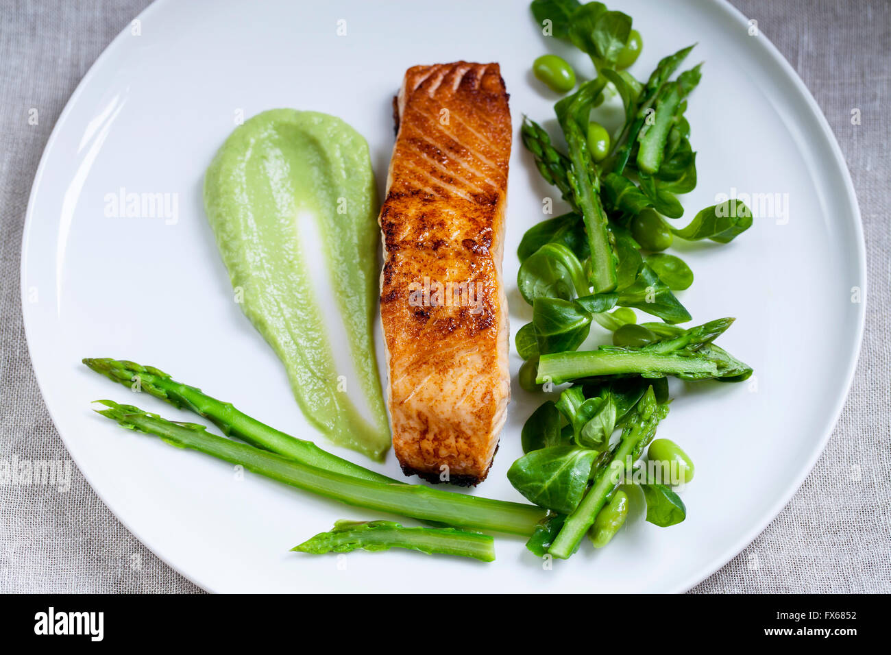 Salmon, lamb lettuce, asparagus and soy beans Stock Photo Alamy