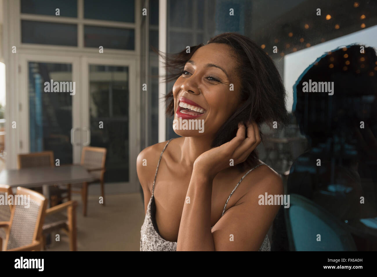 Dark hair woman laughing close up hi-res stock photography and images ...