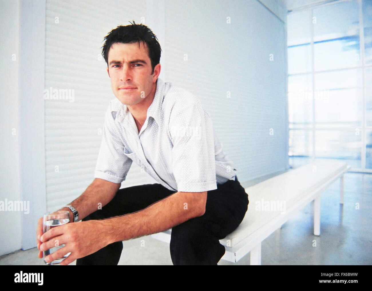 Caucasian businessman sitting in office Stock Photo