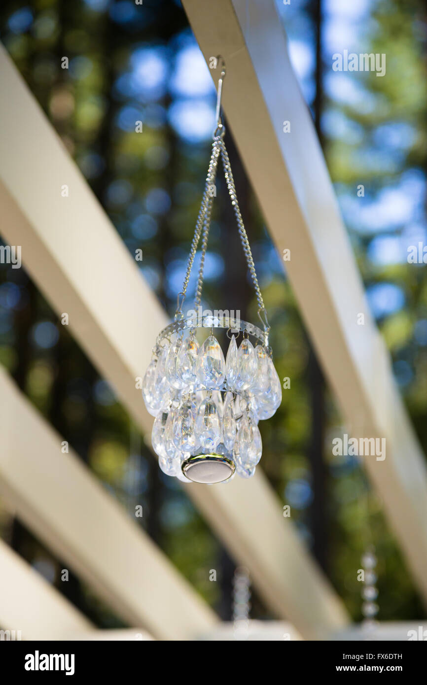Wedding Decorations Hang From A Pergola To Be Used In An Outdoor