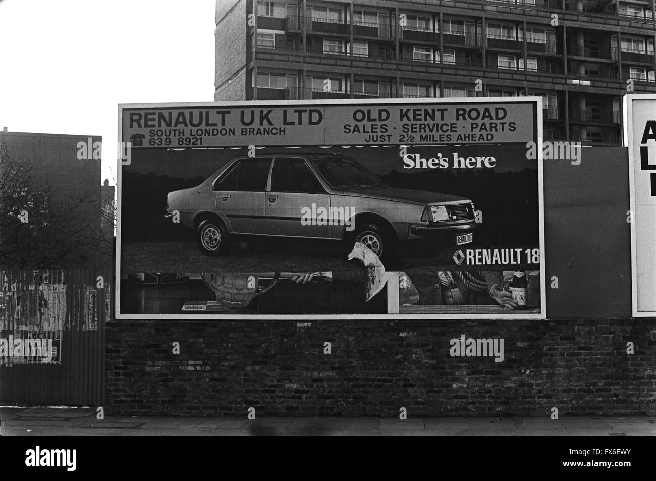 Archive image of a damaged billboard advertising Renault 18 saloon car, Lambeth, London, England, 1979  London 1970s Stock Photo
