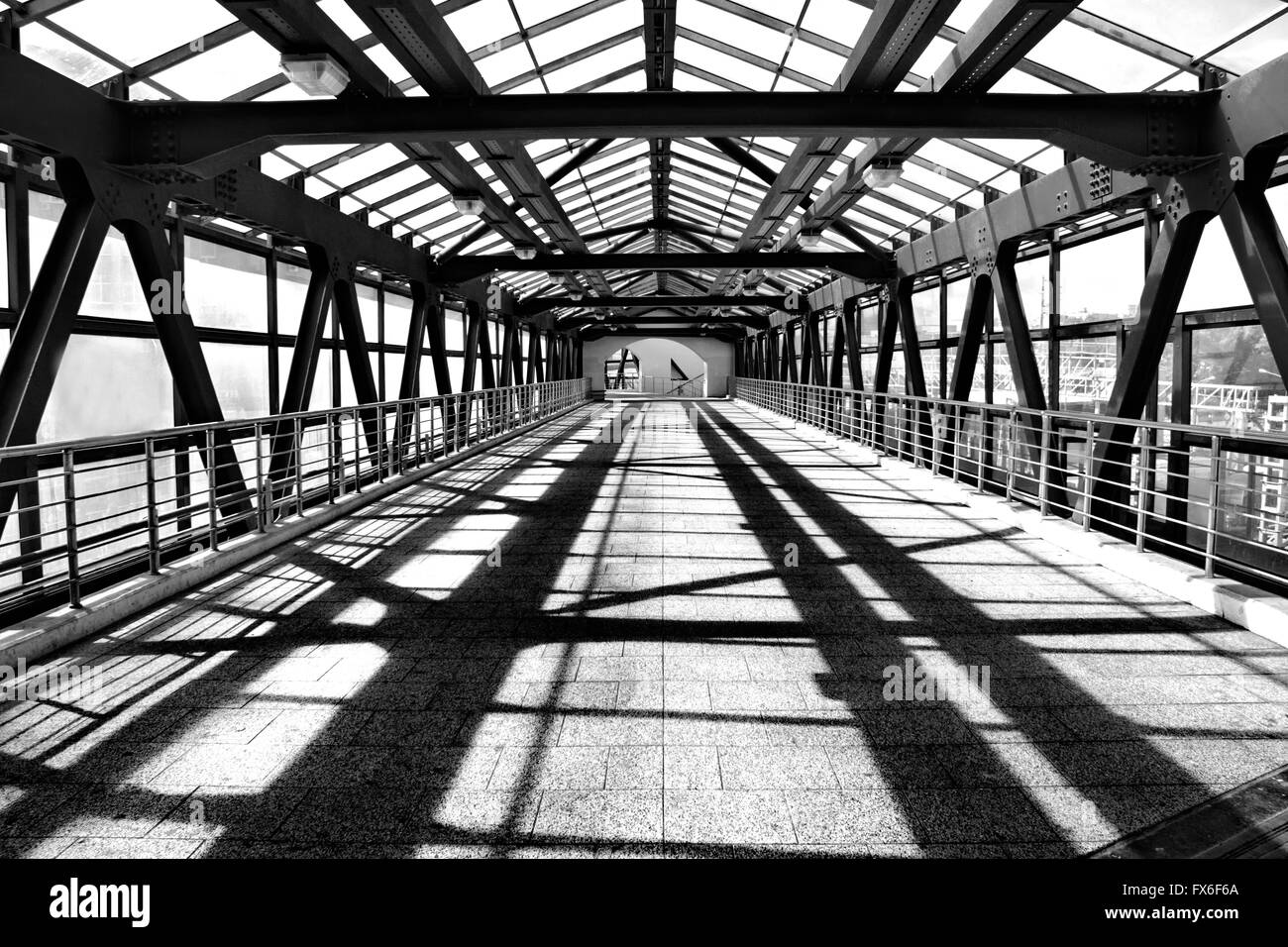 pedestrian steel bridge over railroad Stock Photo