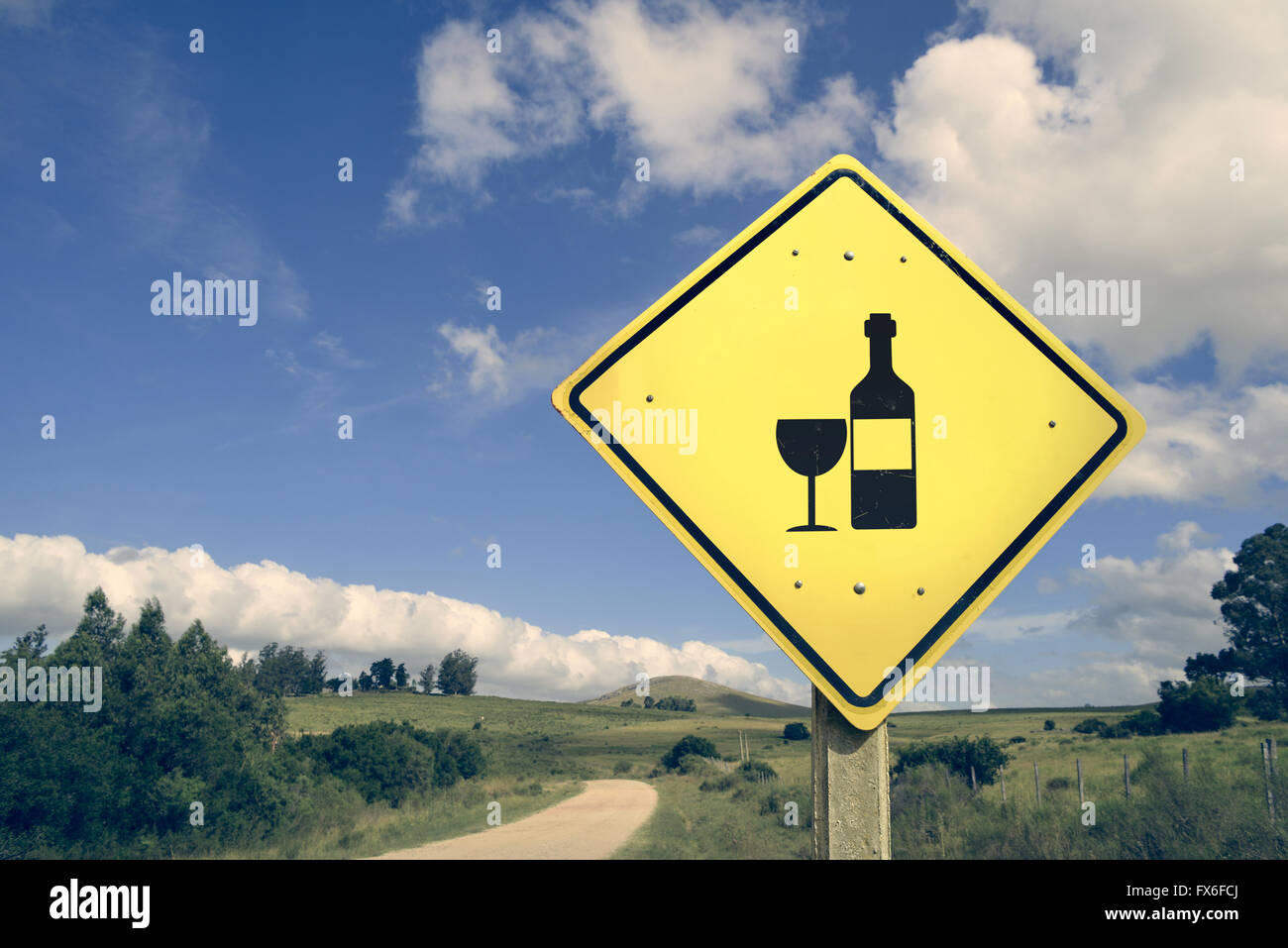 Wine Bottle Road Sign On Empty Dirt Street With Vintage