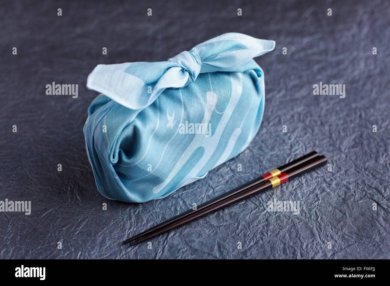 Beautifully wrapped bento box with chopsticks Stock Photo Alamy