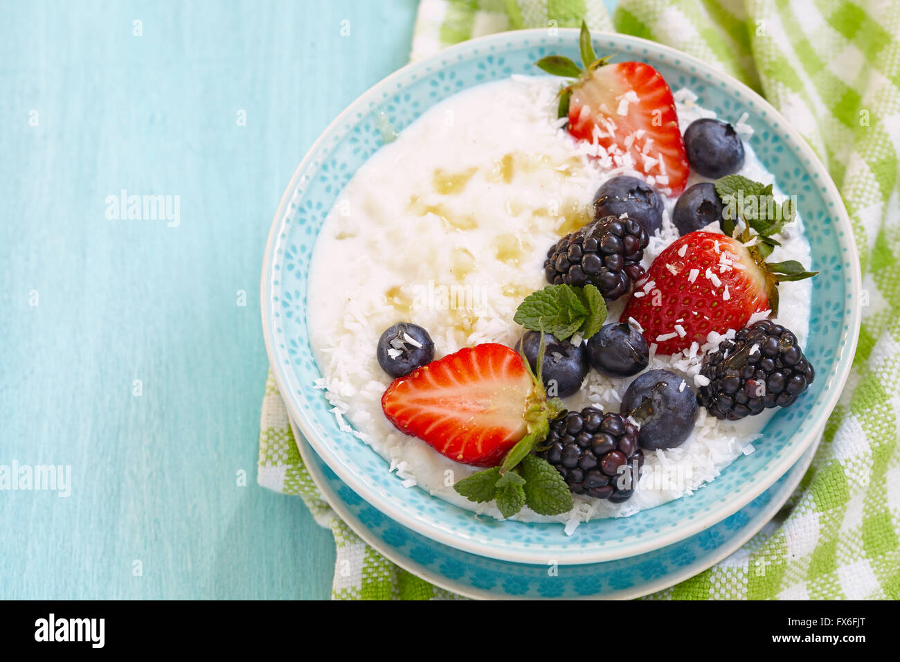 Rice porridge with coconut milk Stock Photo Alamy