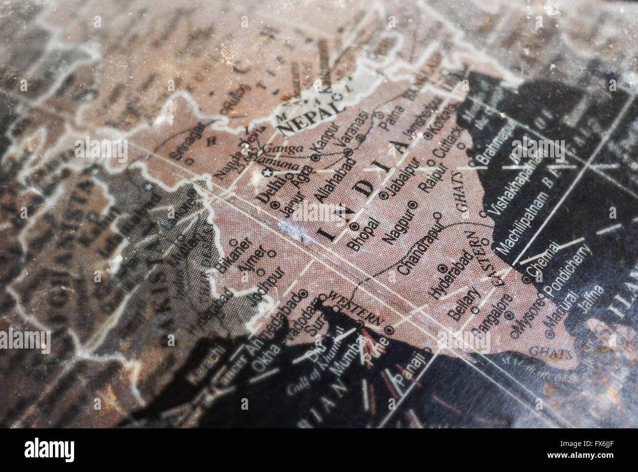 India map on vintage crack paper background, selective focus Stock Photo