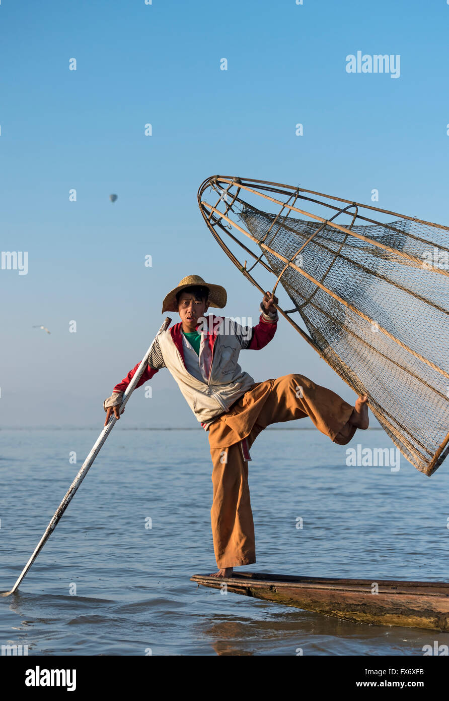 Burmese Fisherman Posing with Foot Holding His Cone Shaped Fishing Net,  Inle Lake, Shan State, Myanmar Editorial Image - Image of conical, shan:  114878585