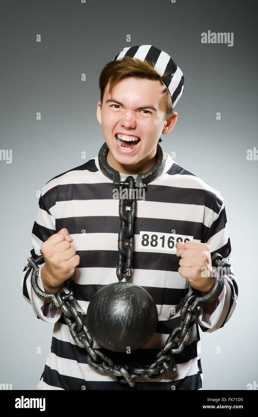 Funny prisoner in prison concept Stock Photo Alamy