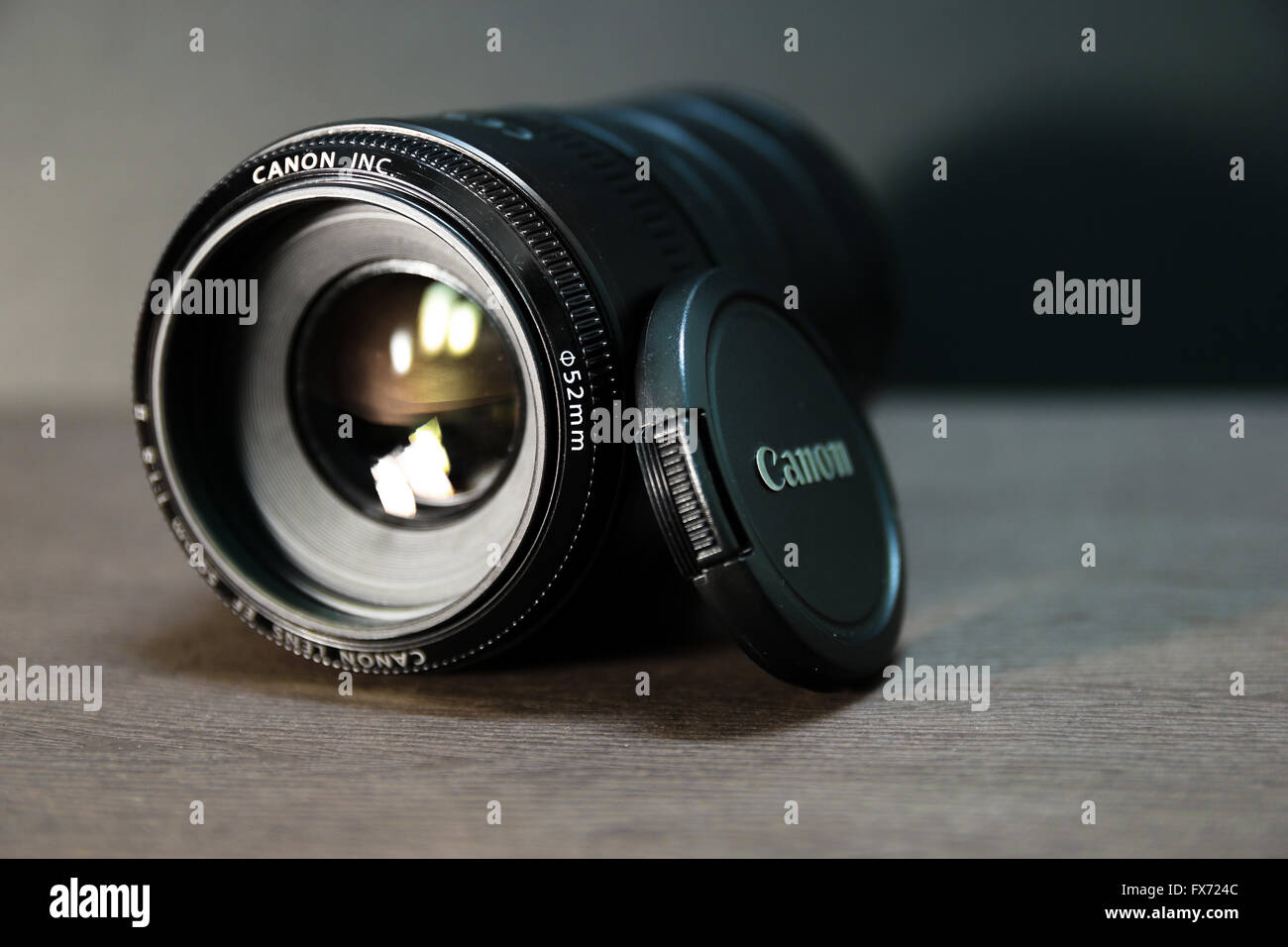 Very popular Canon EF 50mm f/1.8 II lens with extension tube on black