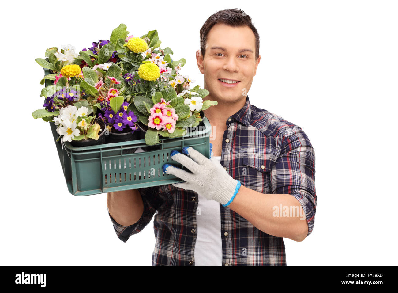 Man holding a crate of flowers isolated on white background Stock Photo