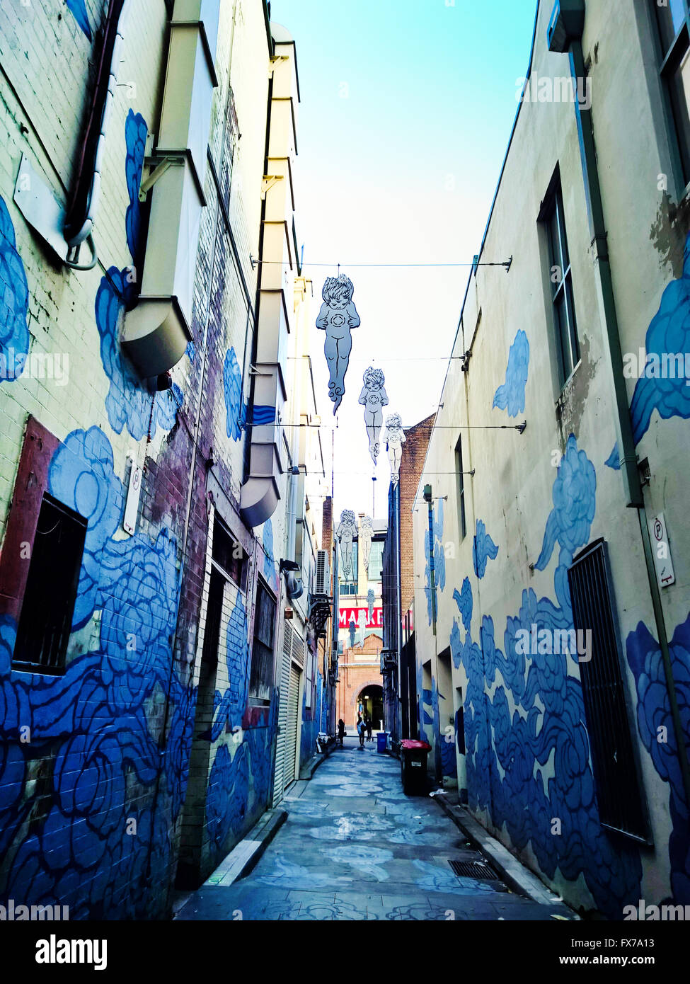 Side Alley artwork In Between Two Worlds by Jason Wing at Chinatown, Sydney, Australia Stock Photo