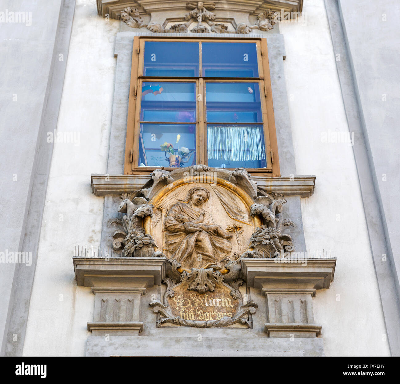 Old town architecture in Graz, Styria, Austria. Virgin Mary bas relief ...