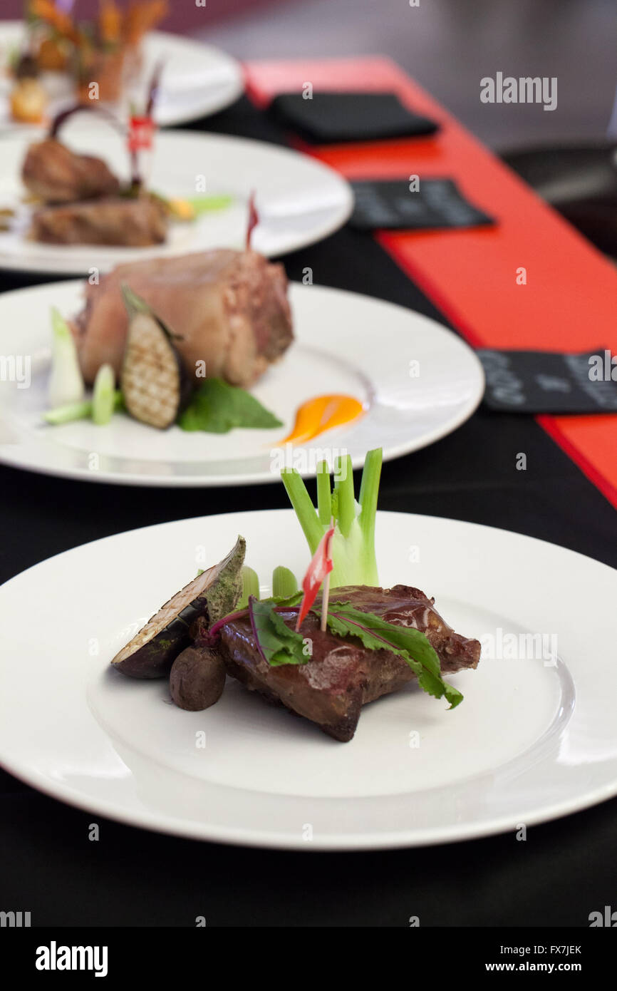 cooked meat dish presentation Stock Photo Alamy