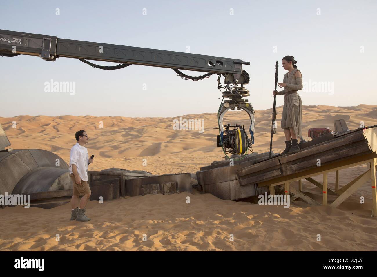 Star Wars: Episode VII - The Force Awakens Year : 2015 USA Director : J.J. Abrams J.J. Abrams, Daisy Ridley Shooting picture Stock Photo