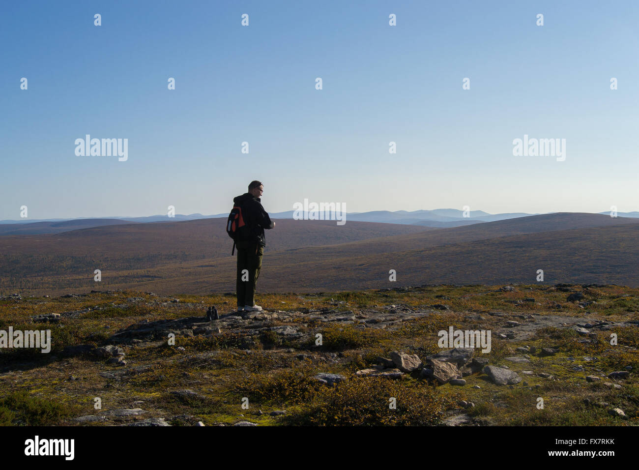 A man standing and looking to mountain scenery Stock Photo