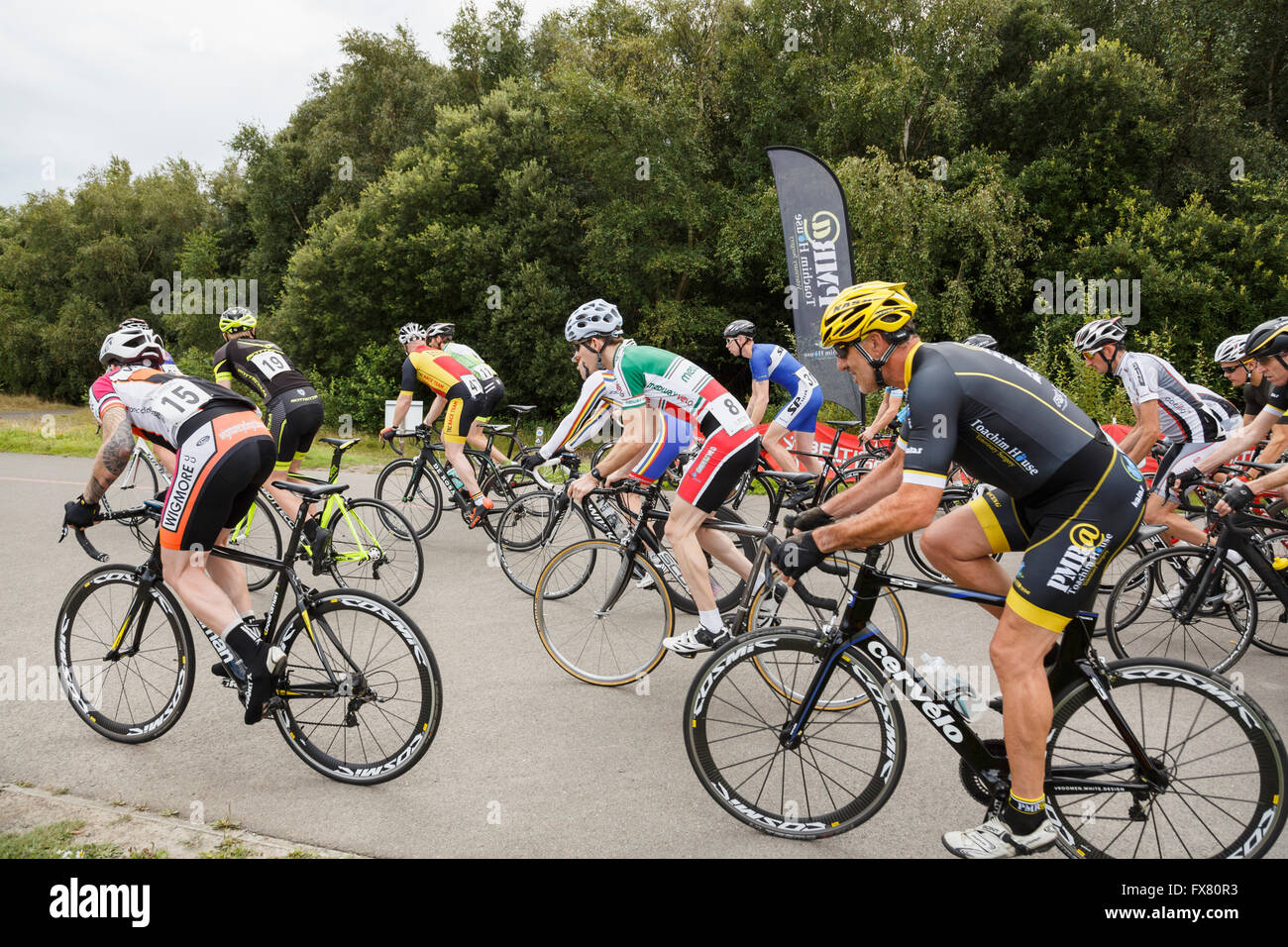 Active cyclists racing in men's Criterium bike race organised by British Cycling at Fowlmead Country Park, Deal, Kent, England, UK Stock Photo