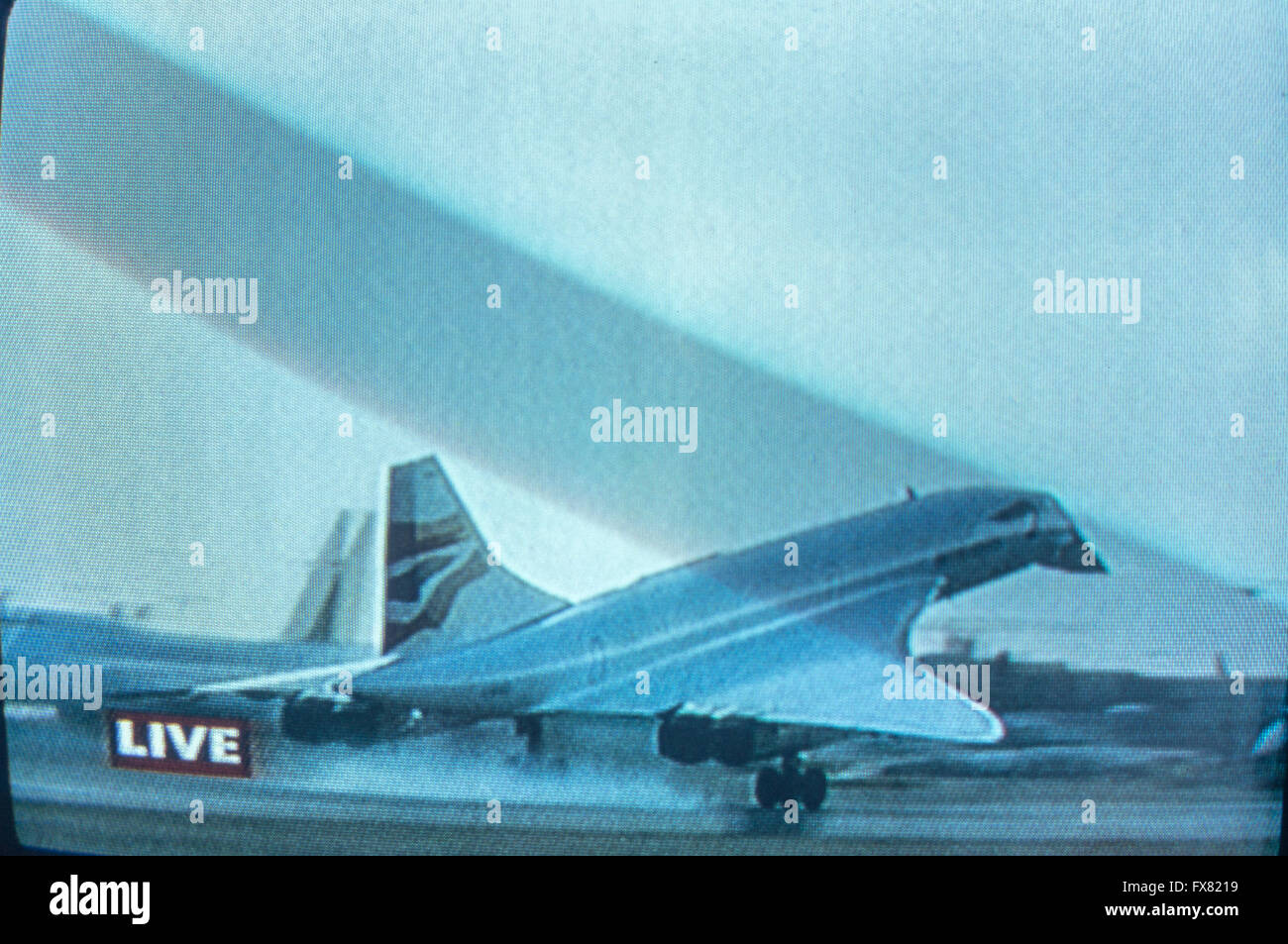 Archive image of last revenue flight of British Airways BAC/Aerospatiale Concorde,  G-BOAG, Speedbird 002 landing at London Heathrow, photographed from TV screen, BBC outside broadcast 24th. October 2003. BBC outside broadcast presented by Raymond Baxter. Now at museum of Flight, Seattle Stock Photo