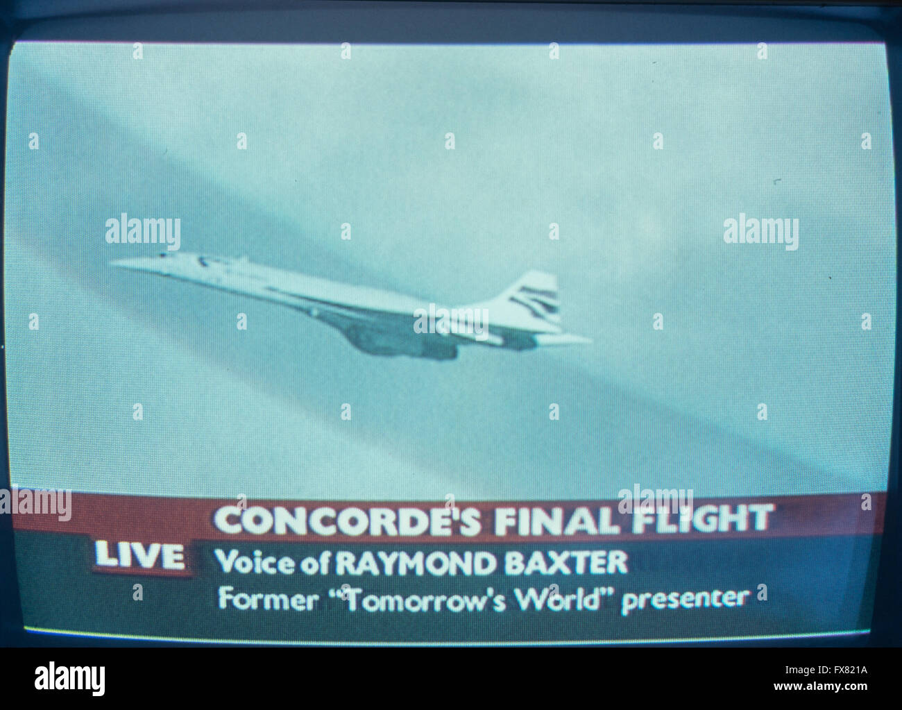 Archive image of last revenue flight of British Airways BAC/Aerospatiale Concorde,  G-BOAG, Speedbird 002 landing at London Heathrow, photographed from TV screen, BBC outside broadcast 24th. October 2003. BBC outside broadcast presented by Raymond Baxter. Now at museum of Flight, Seattle Stock Photo